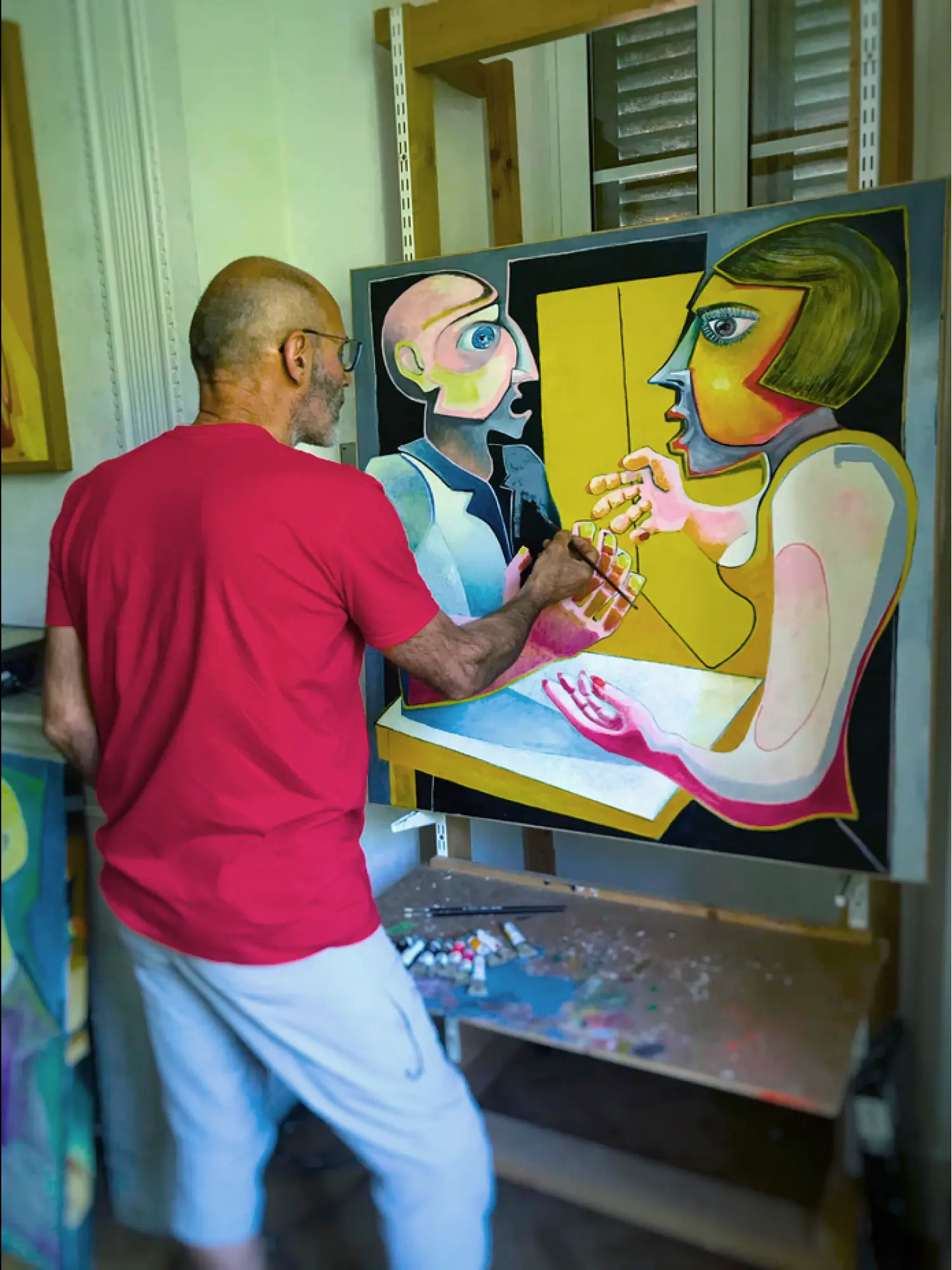 Marc Baro 1 Photo de l'artiste peintre Marc Baro en train de peindre un tableau